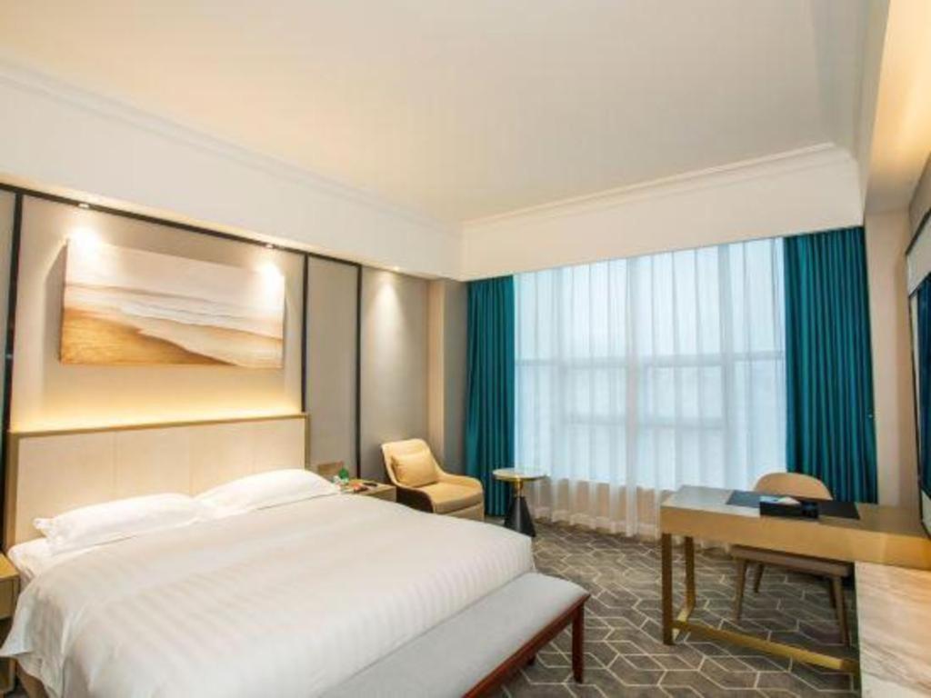Fenggang Gladden Hotel Tiantangwei Екстер'єр фото