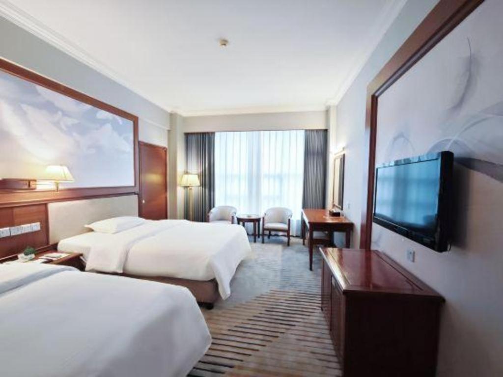 Fenggang Gladden Hotel Tiantangwei Екстер'єр фото