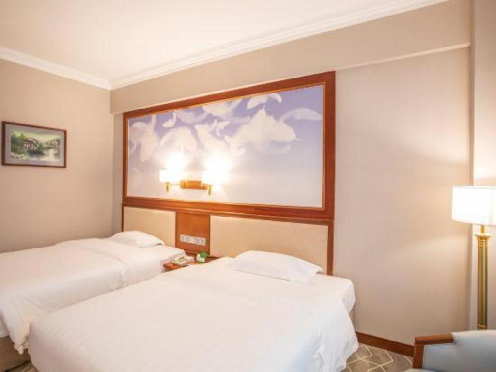 Fenggang Gladden Hotel Tiantangwei Екстер'єр фото